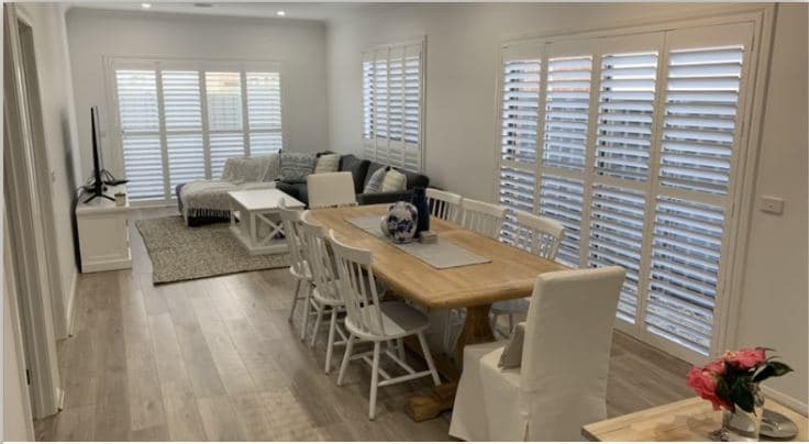 Plantation shutters fitted in a dining room